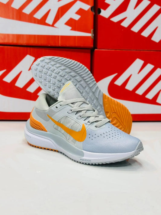 NIKE AIR ZOOM VOMERO 15 MULTI GREY AND ORANGE