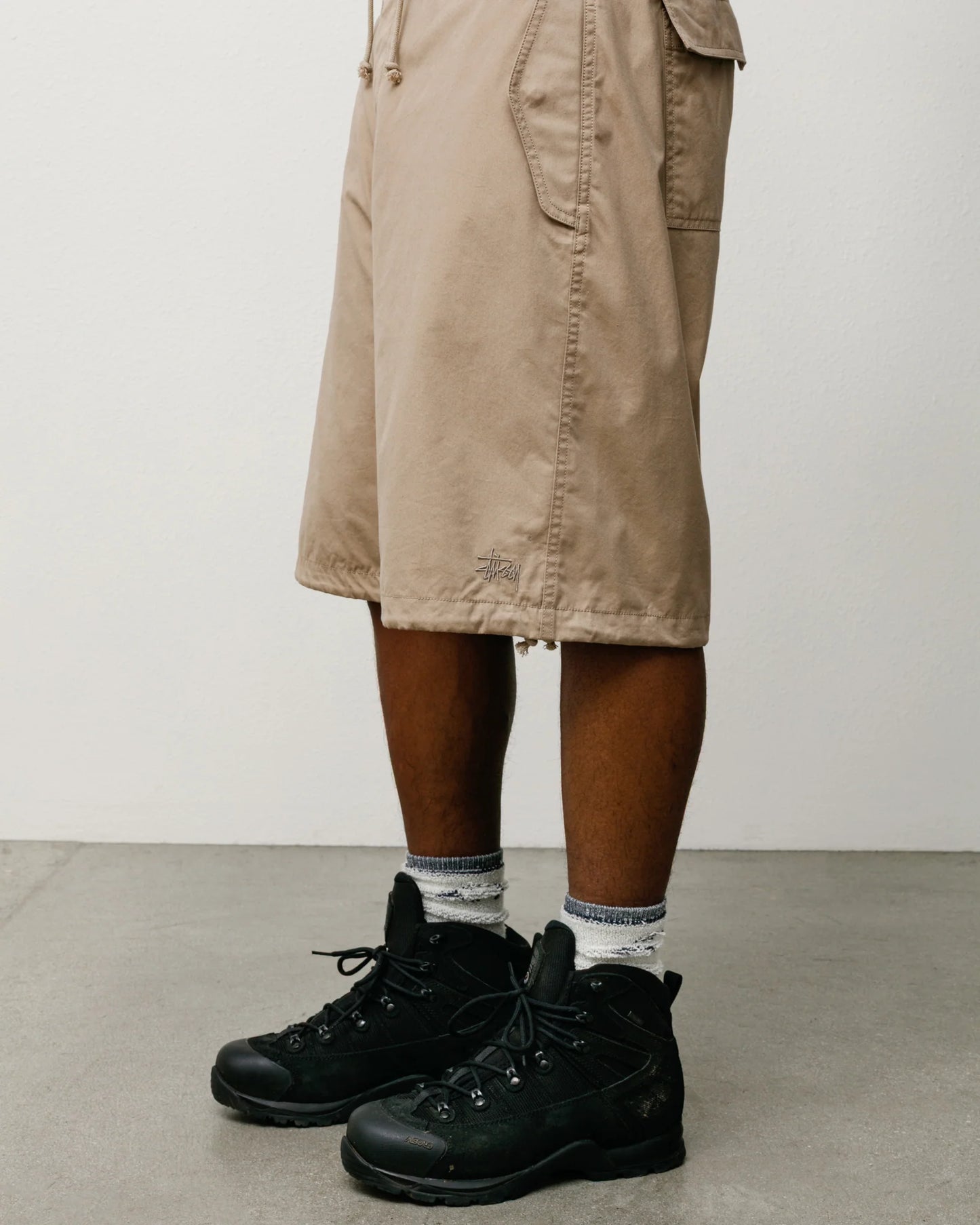 SURPLUS SHORT